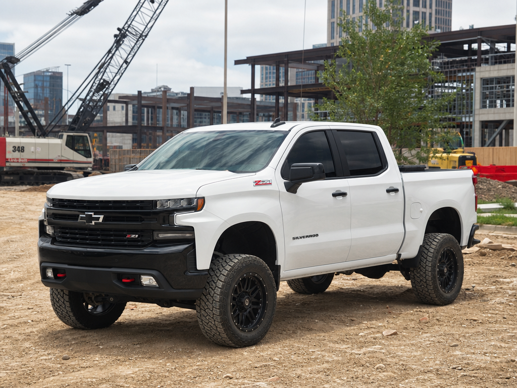 Lifted Chevy Silverado parked at a Houston jobsite