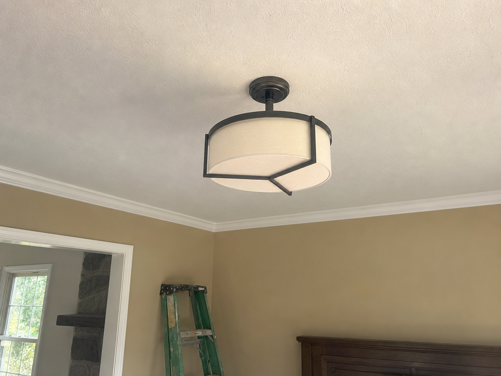 New pendant light fixture installed over a kitchen counter
