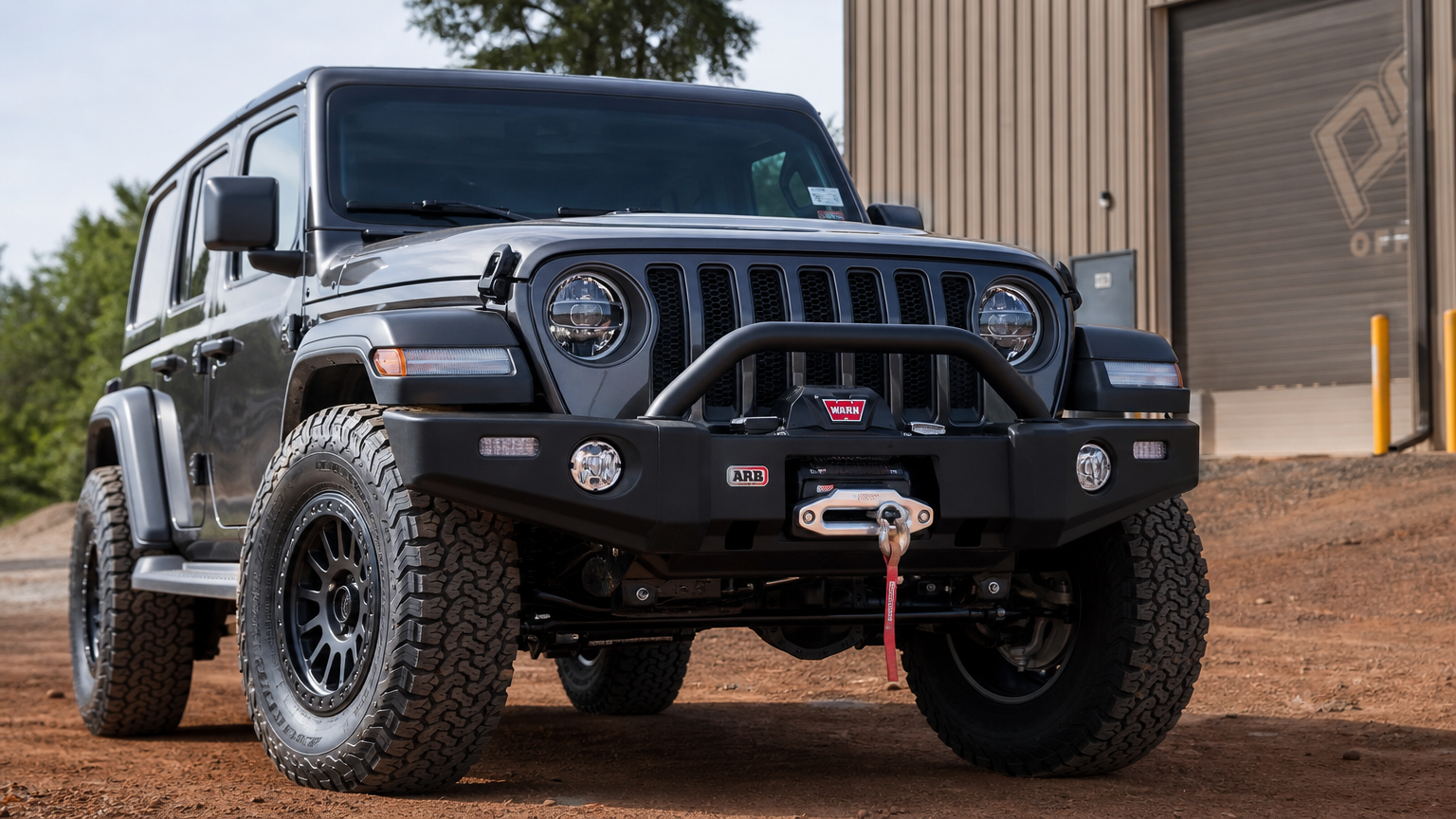 Project Sundowner JL Wrangler front build shot showing ARB bumper and Warn winch