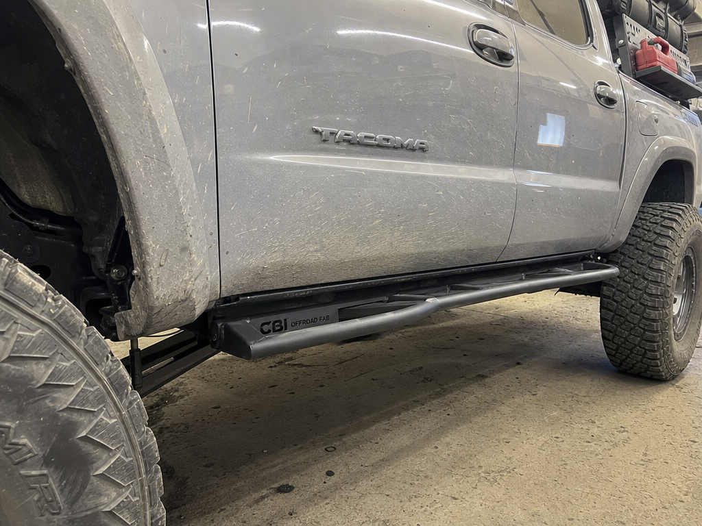 CBI Offroad Fab rock sliders installed on Project Redrock Toyota Tacoma