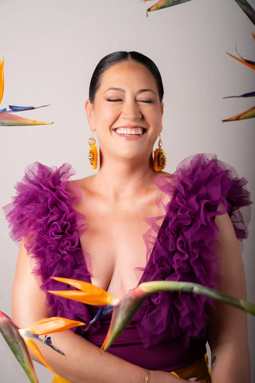 Carmen Rosas, with birds of paradise