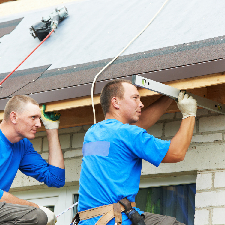 Guys Nailing Roof
