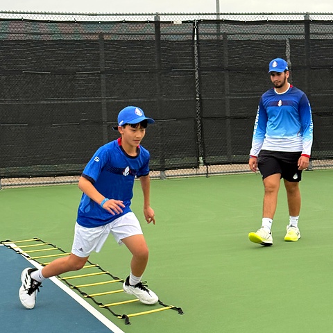 Zenniq Academy junior tennis player training in a structured academy culture and player development environment