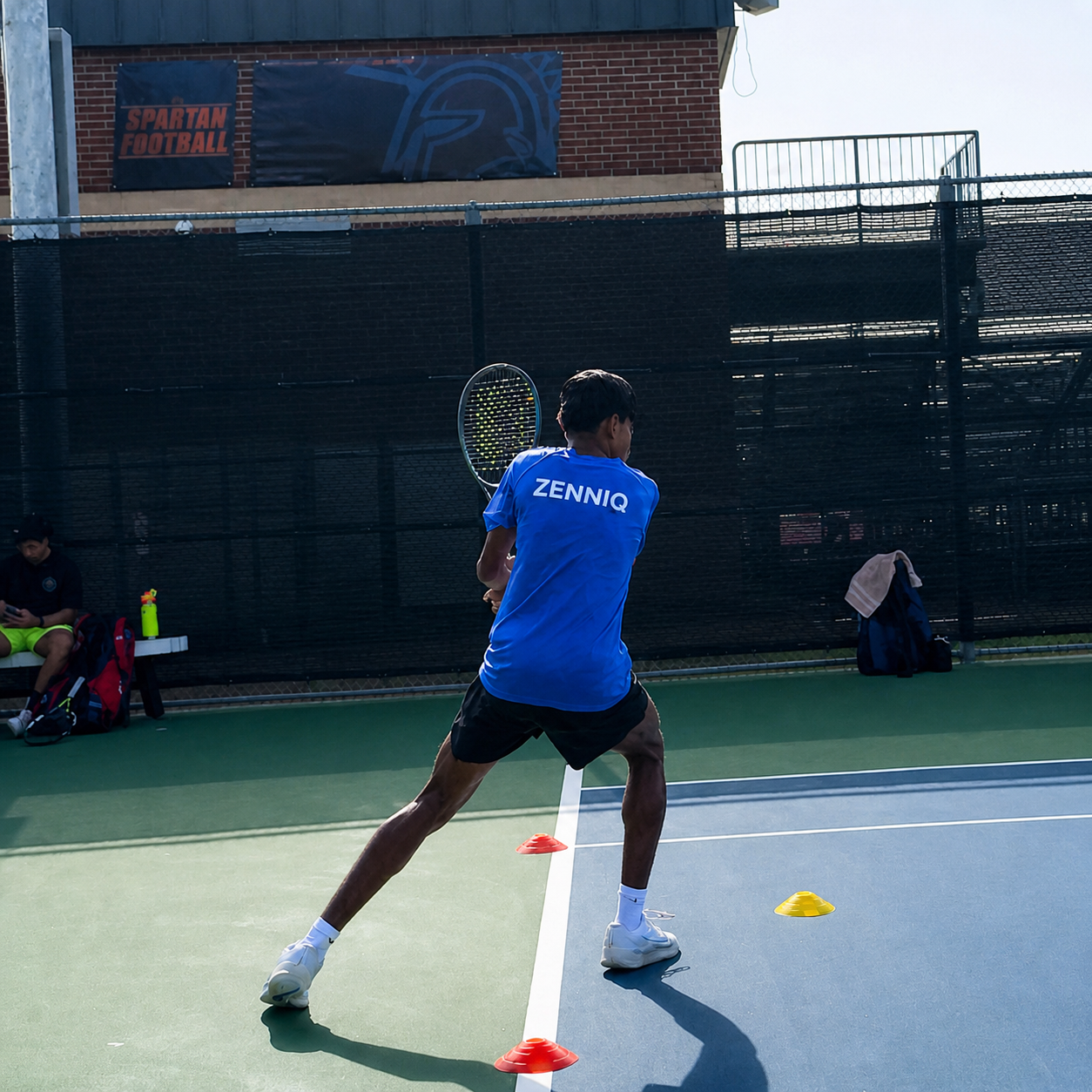 Zenniq Academy tennis player preparing a backhand during results focused training in Katy Texas