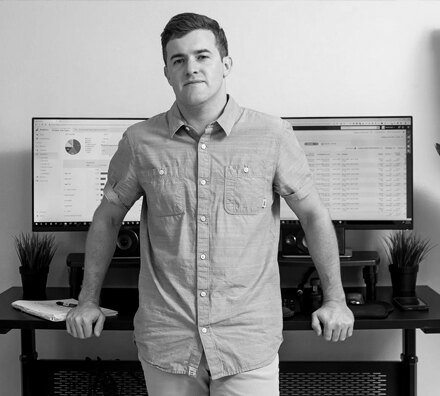 Blake Hickey at a desk with ad dashboards on screen