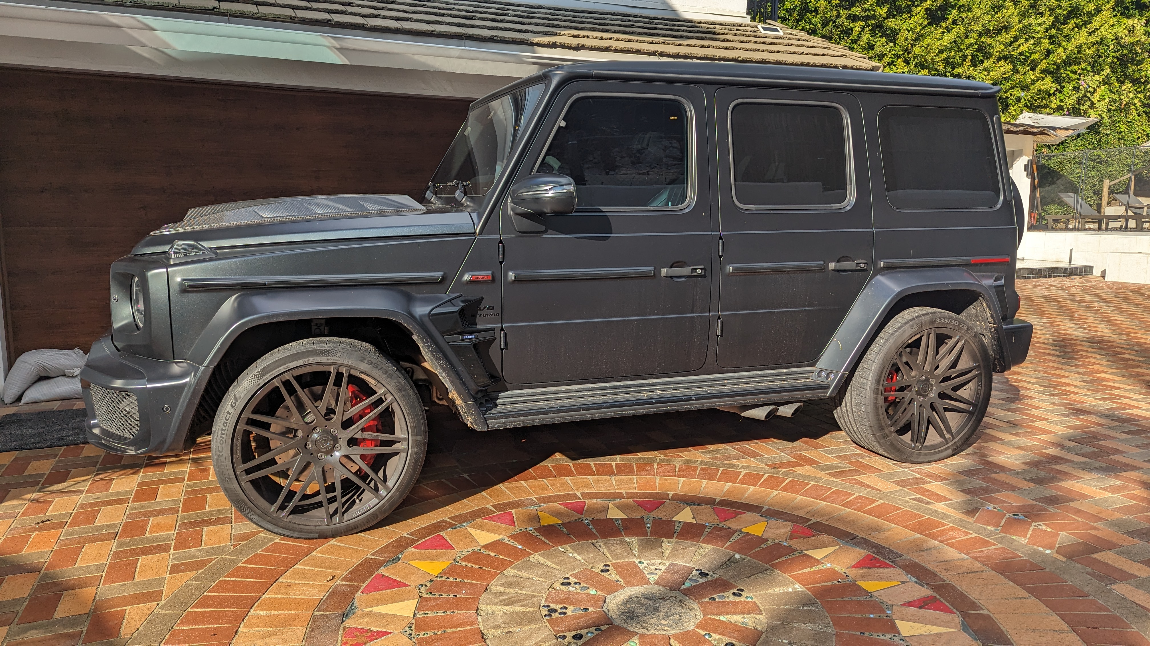 Mercedes-AMG G63 before mobile detailing Valley Village — dirty road film