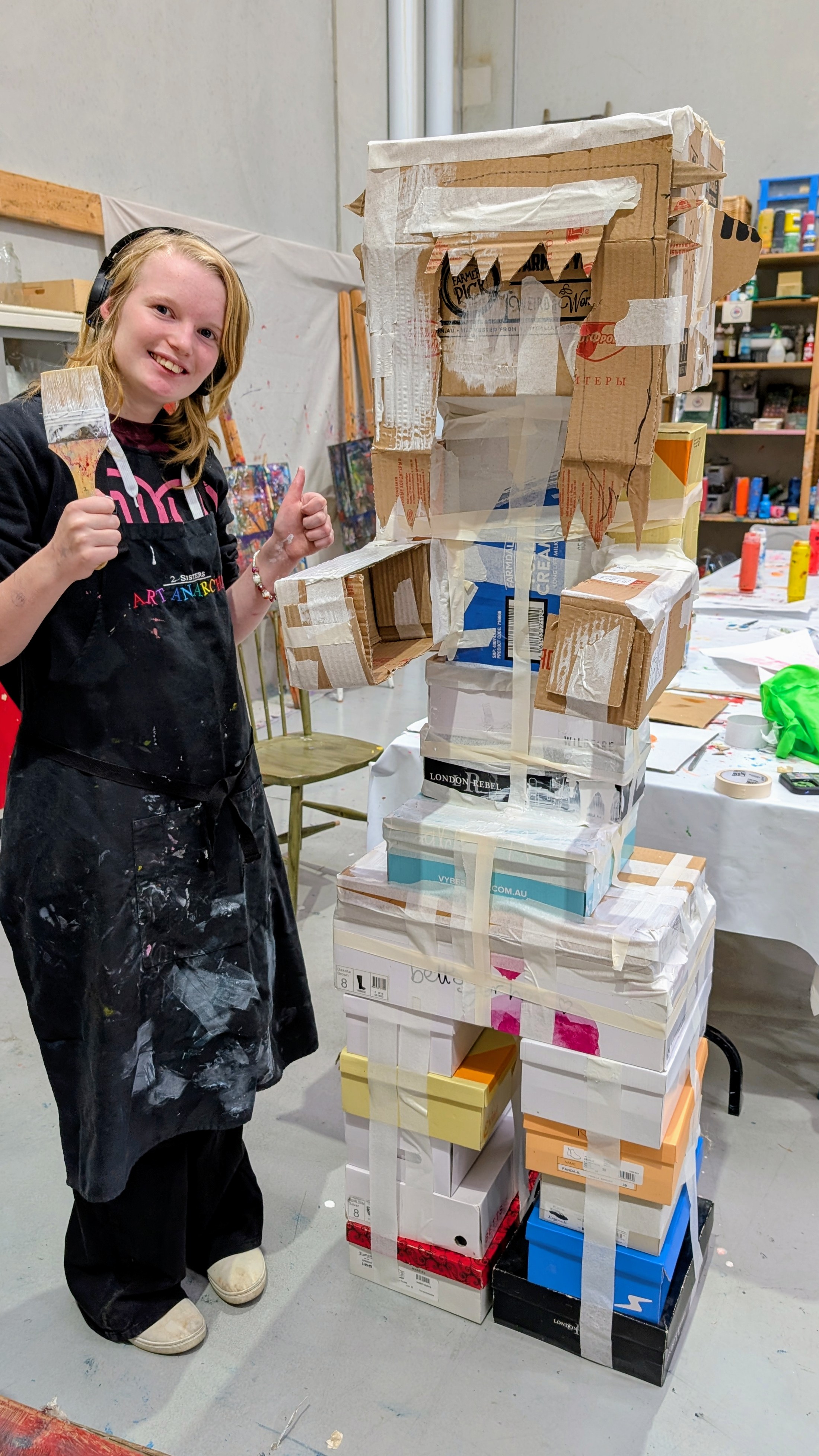 Child exploring art materials at Creative Makes studio, Hastings Child exploring art materials at Creative Makes studio, Hastings