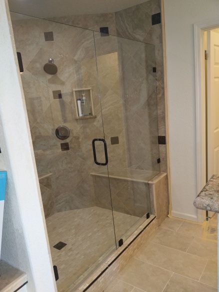 Bathroom renovation with modern tile and fixtures by Square Up Construction in Roseville CA