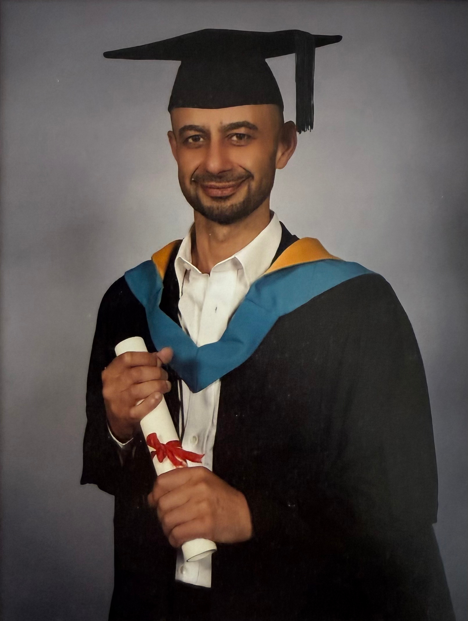 Hassan at his sports psychology graduation