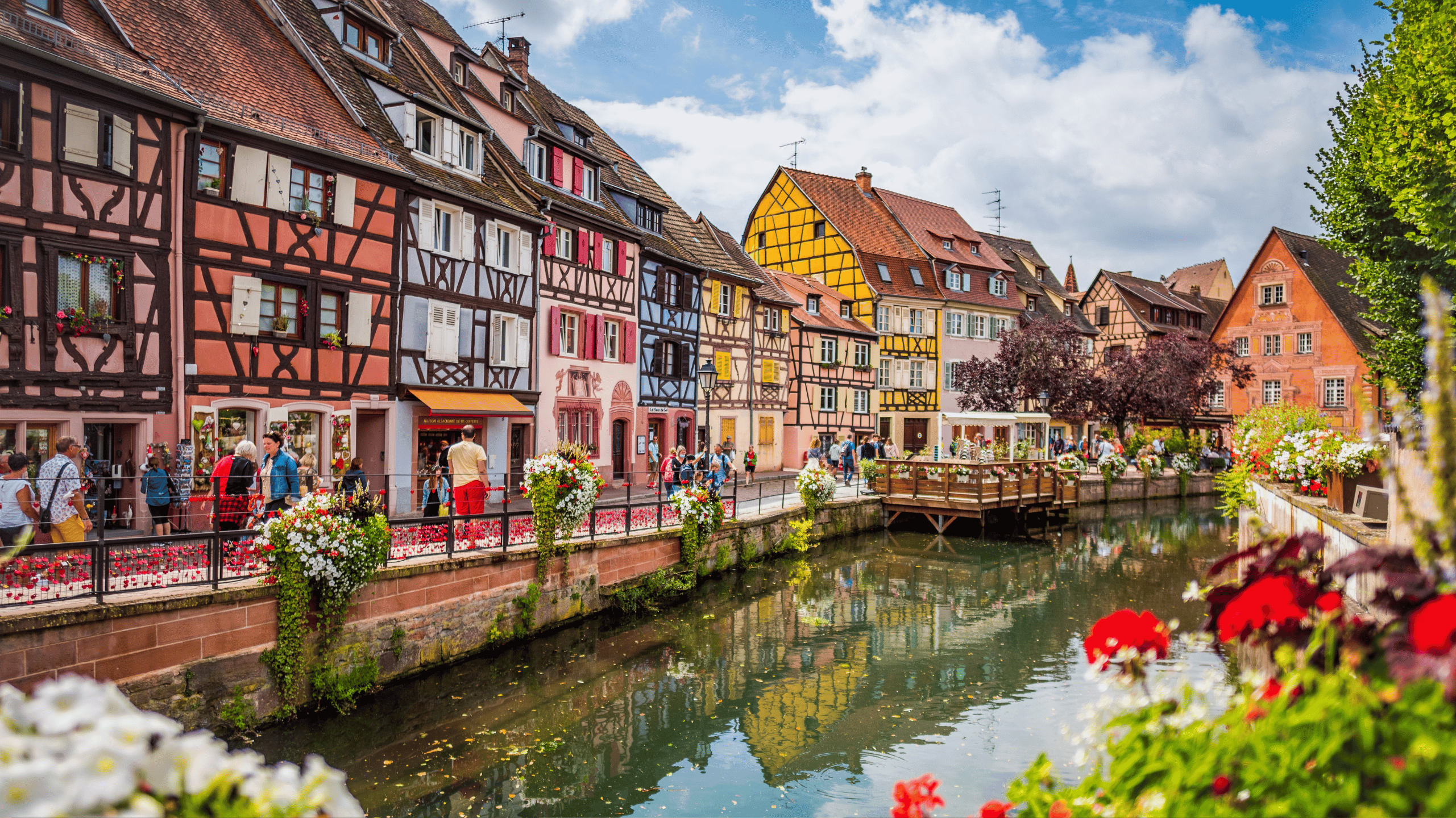 Colorful Colmar street with canal