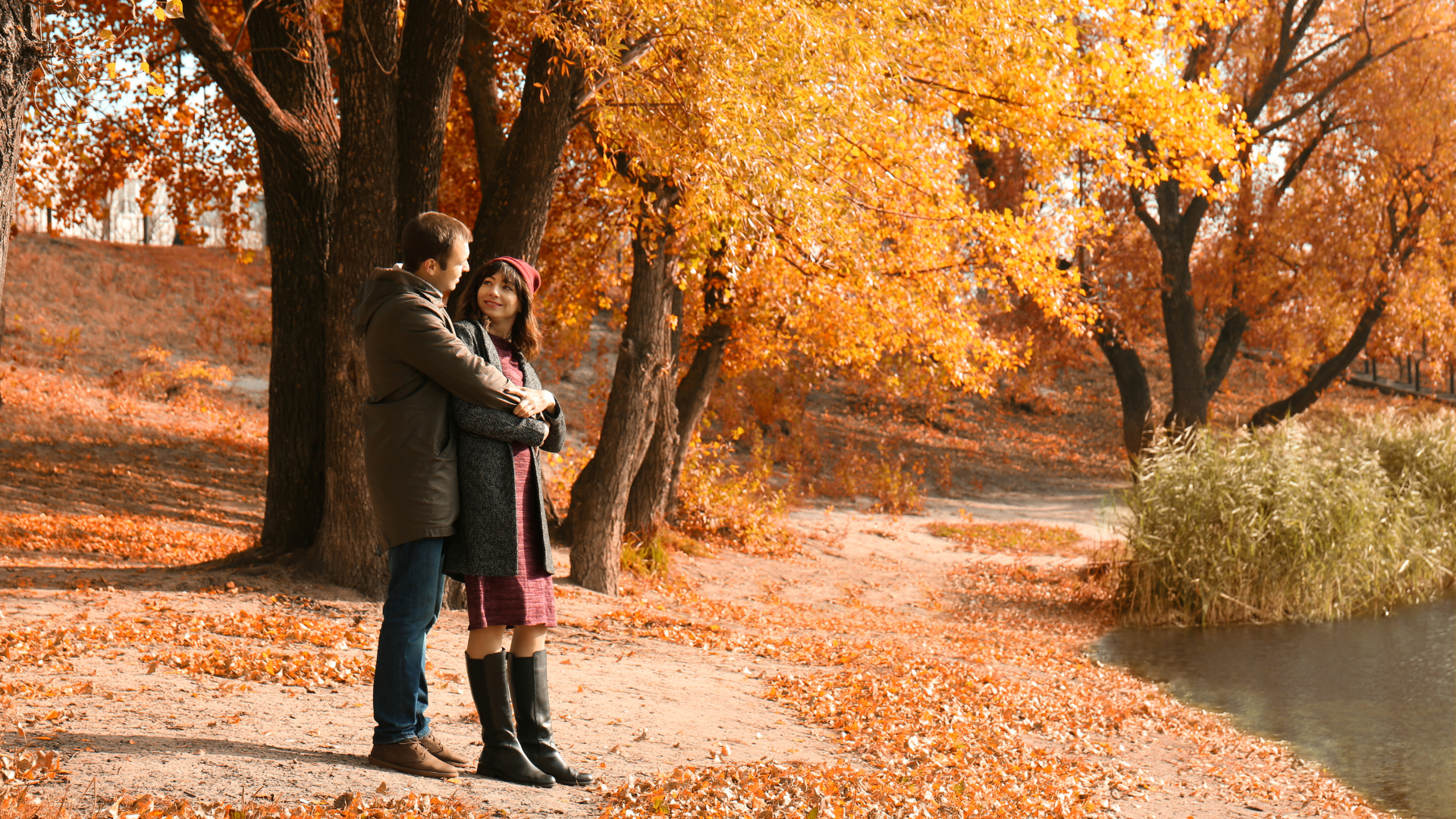 A couple enjoying the autumn view A couple enjoying the autumn view