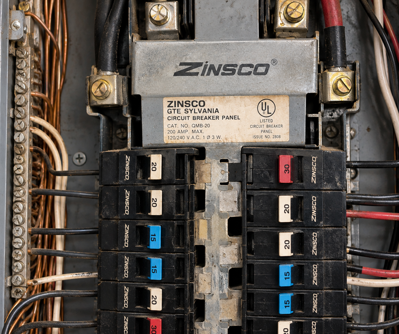 A close-up of a Zinsco breaker panel showing the brand markings that prompt insurance companies to deny coverage. A close-up of a Zinsco breaker panel showing the brand markings that prompt insurance companies to deny coverage.