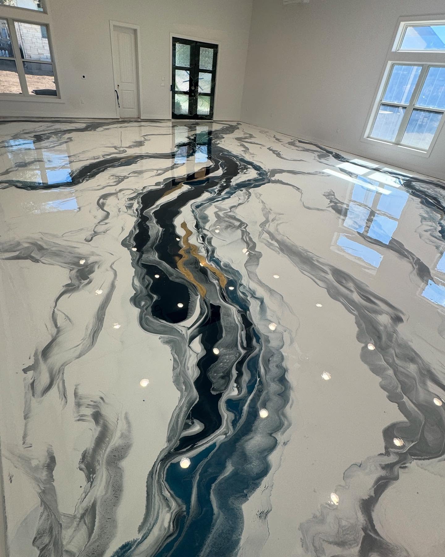 Pearl, blue & charcoal metallic epoxy flooring installed by ORIX