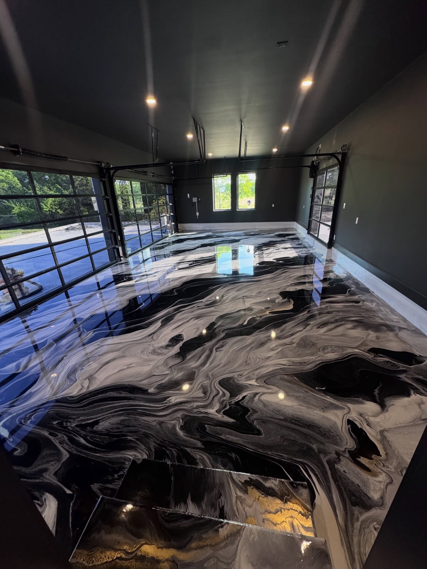 Black, bronze & white metallic epoxy flooring installed by ORIX