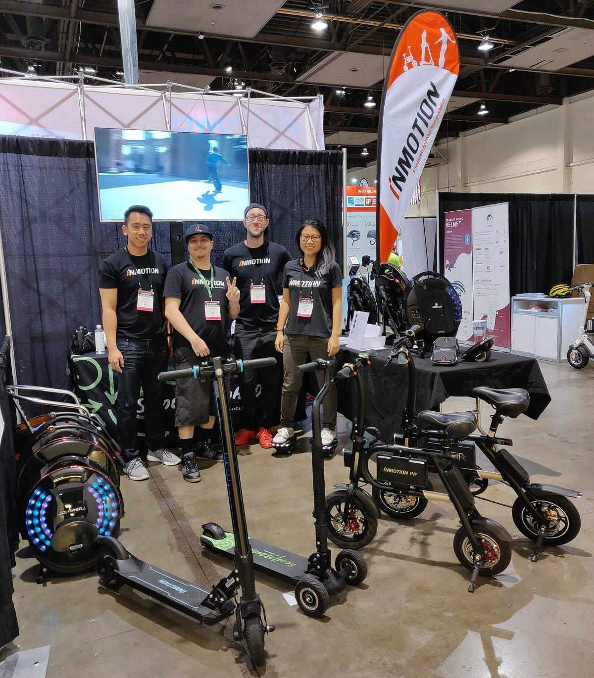 Bilingual team presenting product to buyers at a US trade show