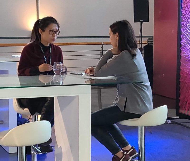 The founder in a business meeting
