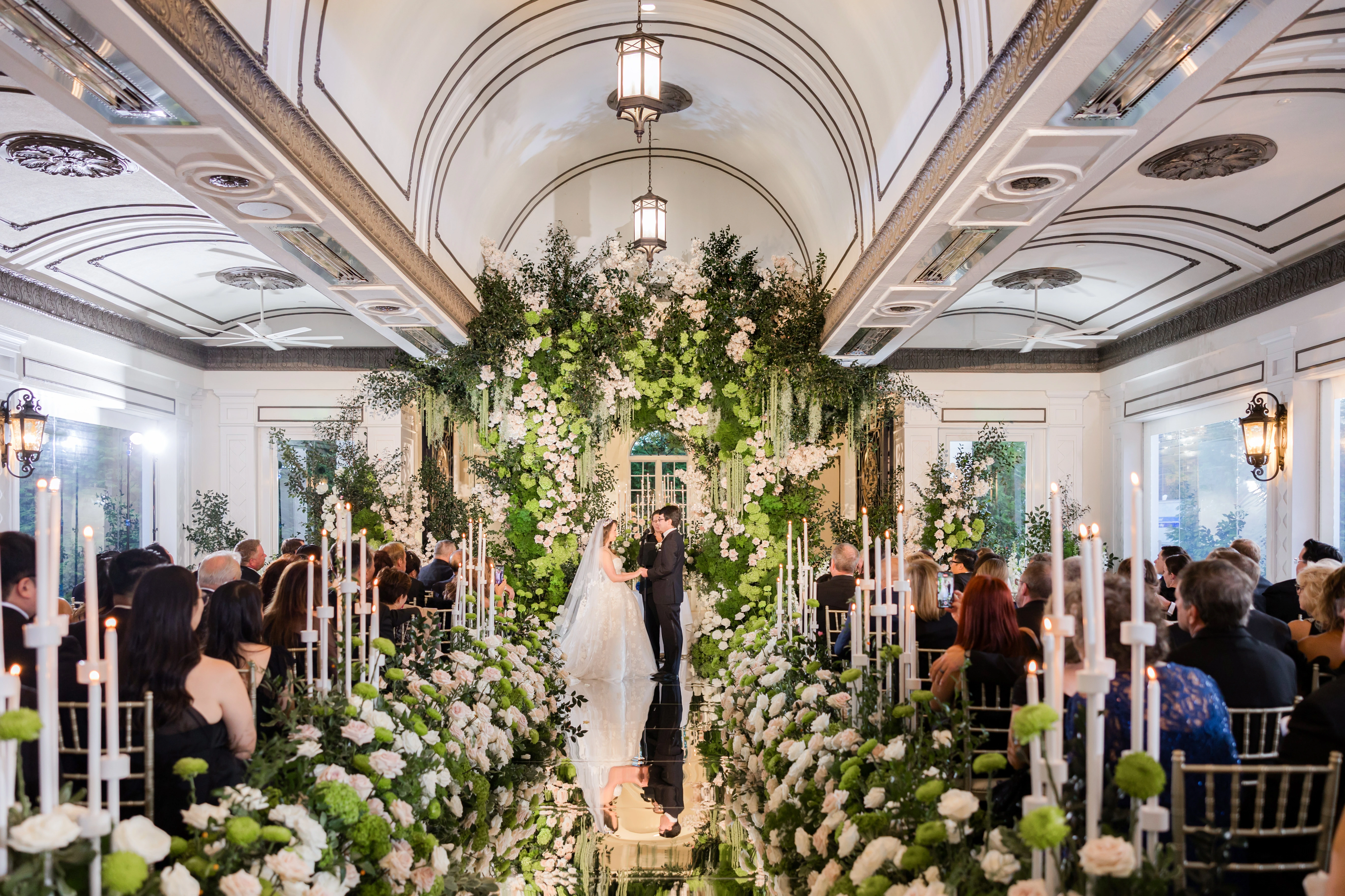 Welcome signage with white florals