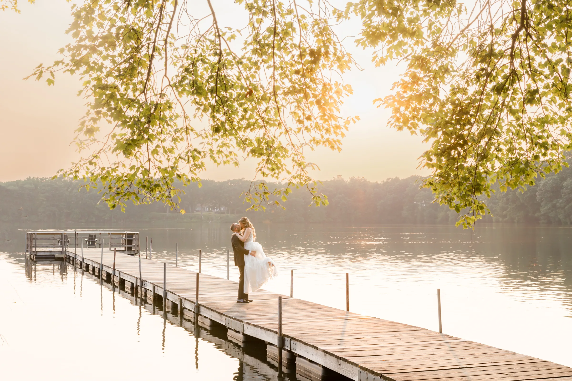 Mary and Keith — couple on the dock at sunset