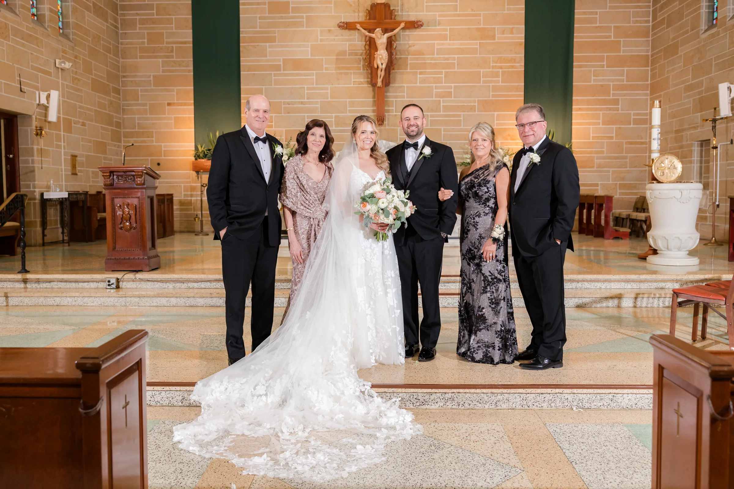 Mary and Keith — couple at the altar with the priest