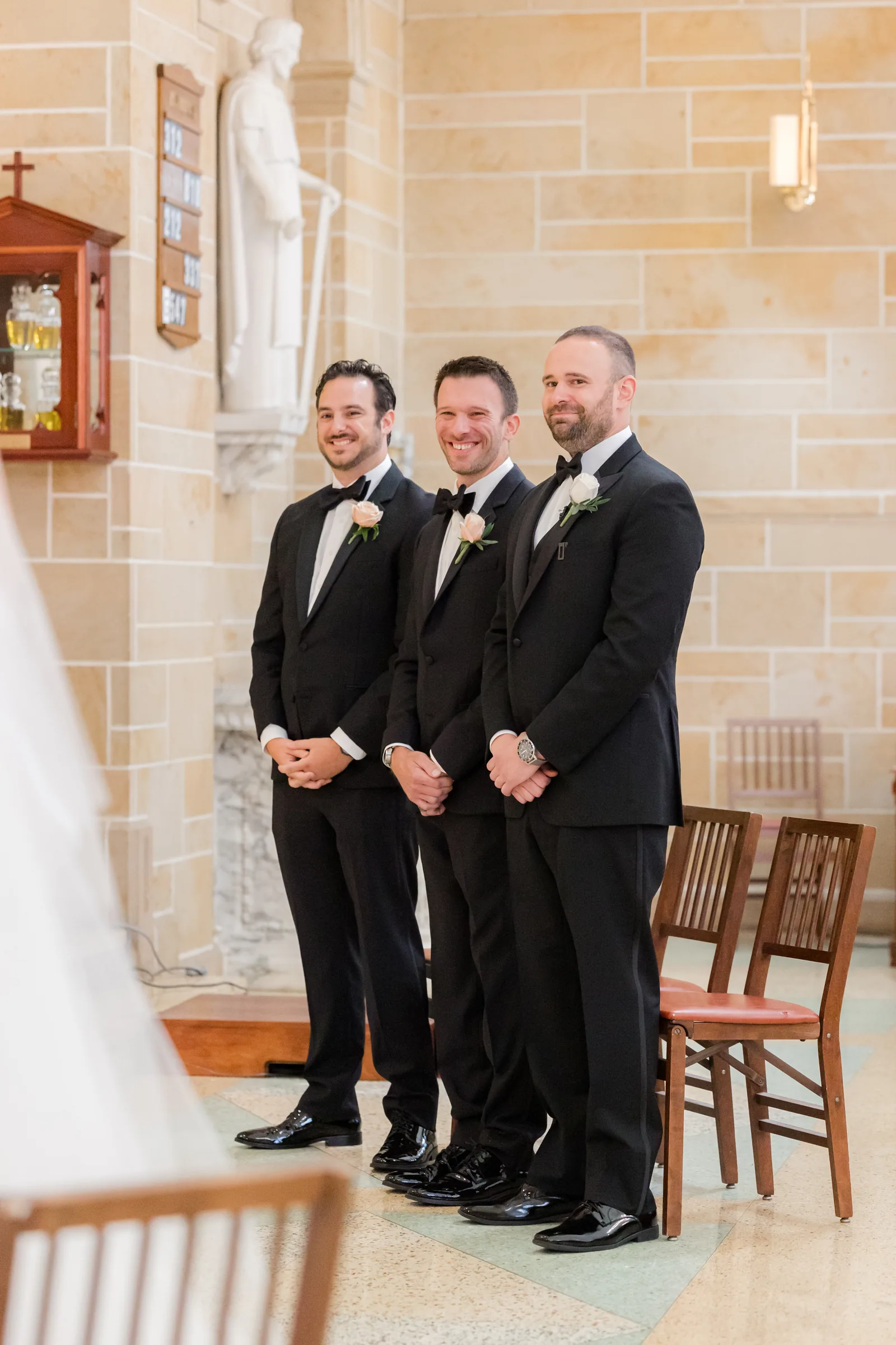 Mary and Keith — groomsmen at the stone wall