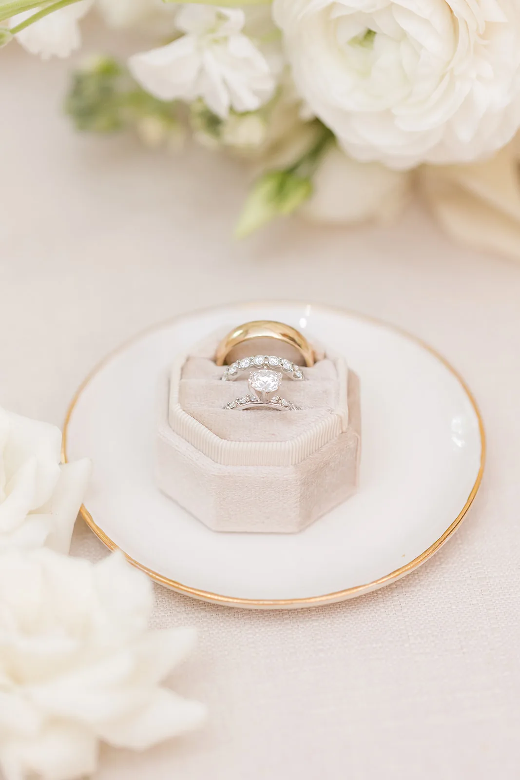 Eleni and Vasili — wedding ring on a white rose