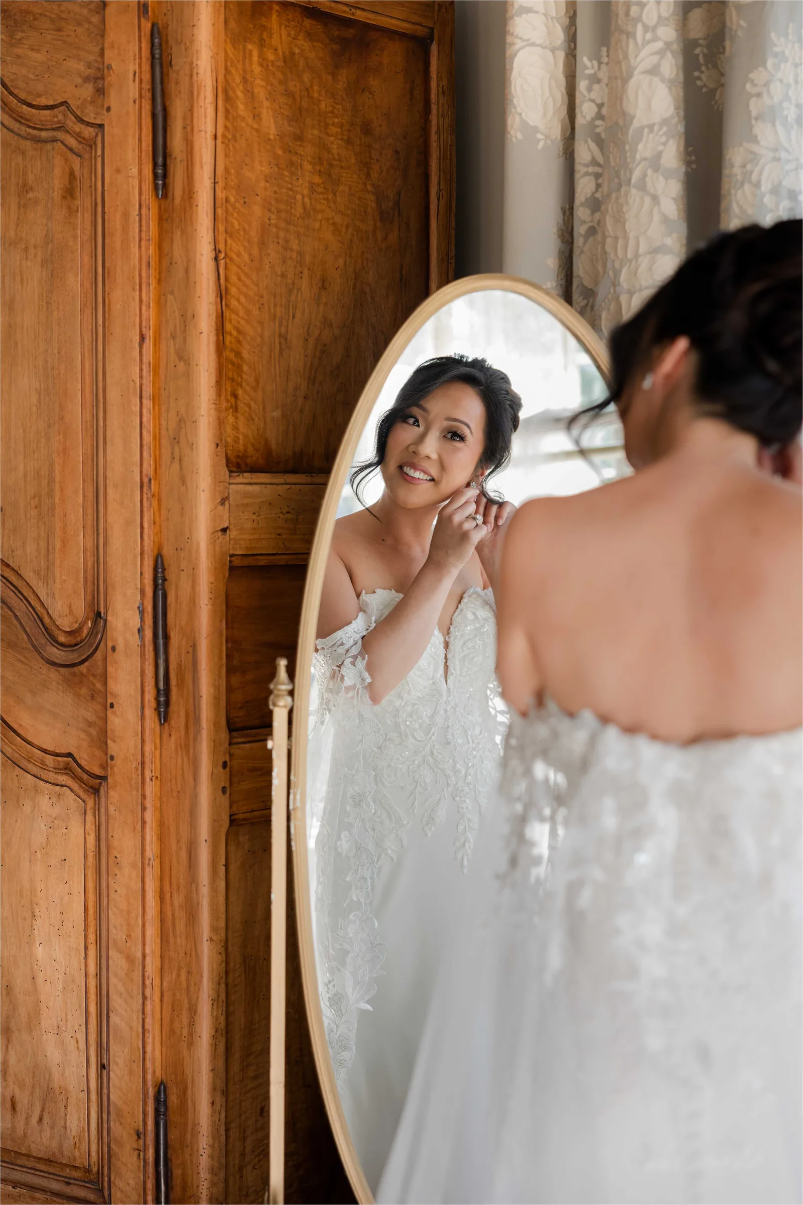 Stephanie and Cliff — bride at the entryway mirror