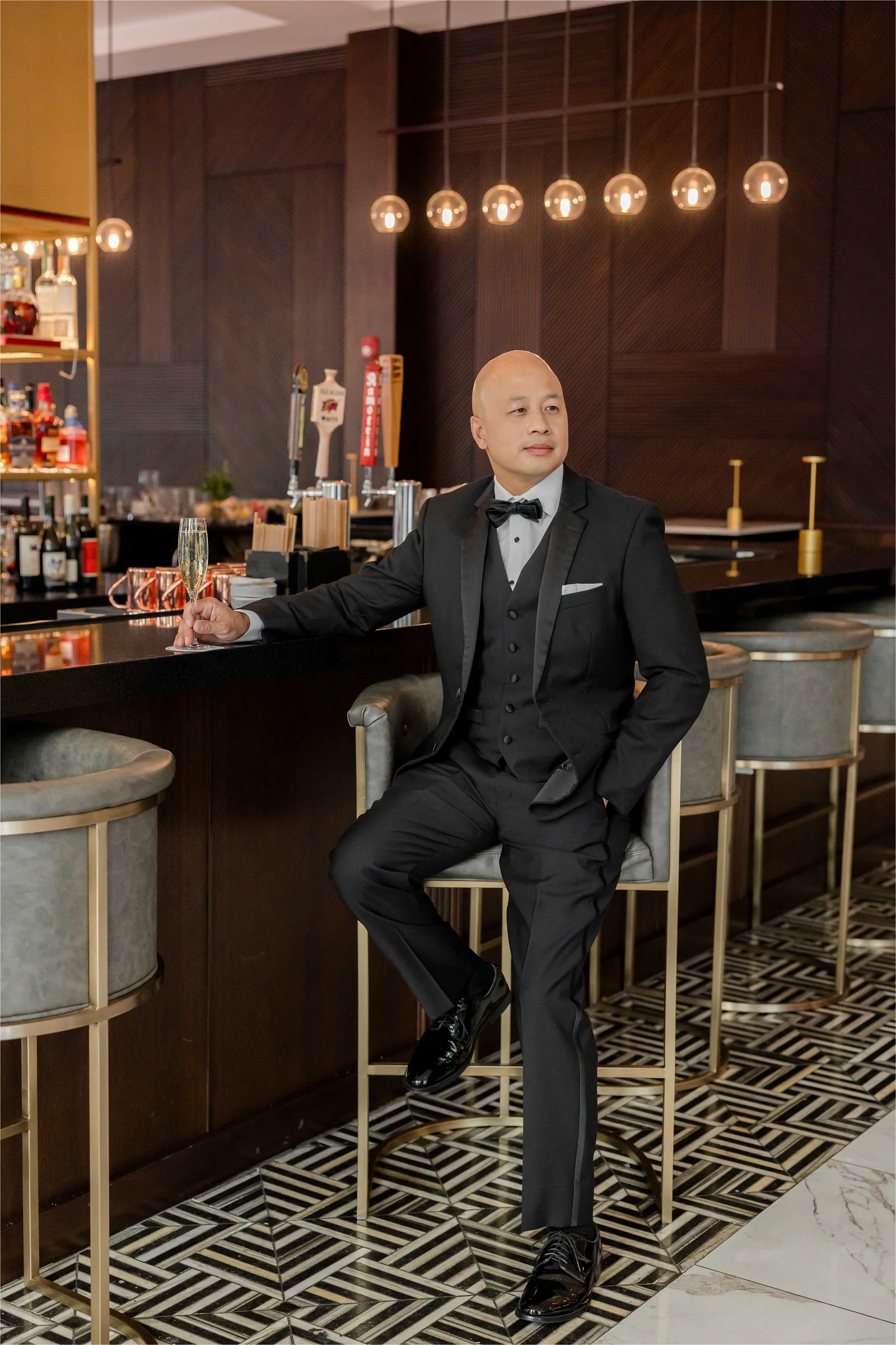Stephanie and Cliff — groom at the bar