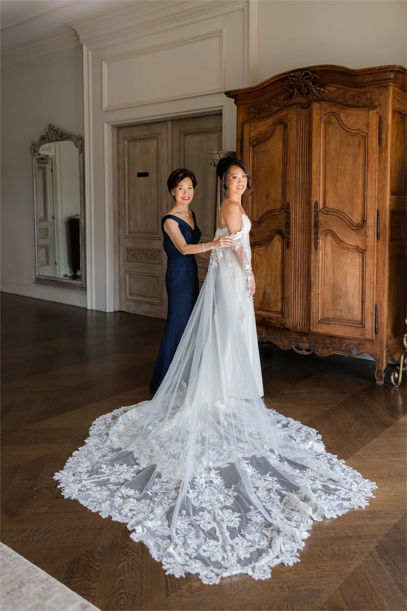 Stephanie and Cliff — bride and mother at the mirror