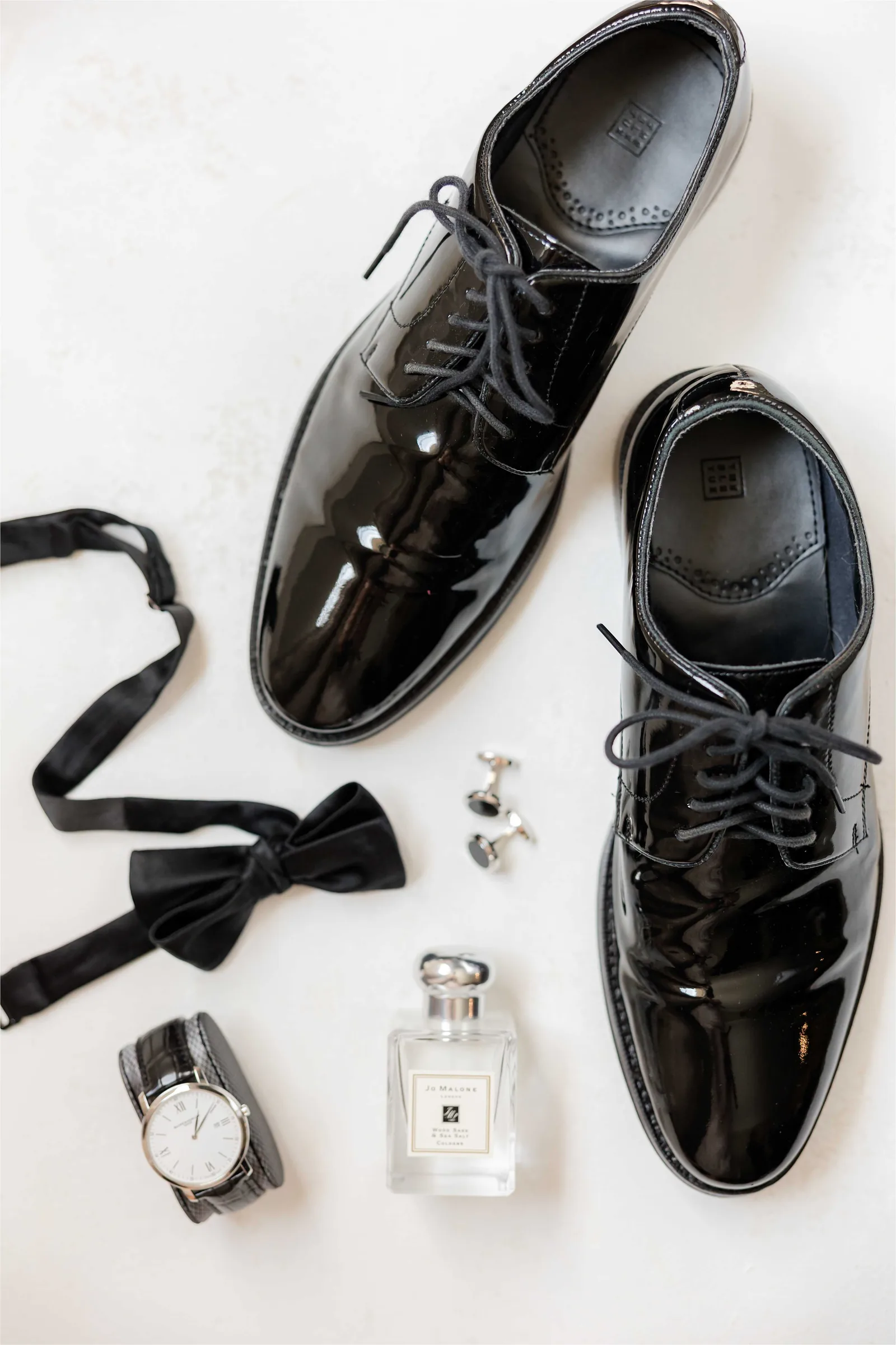 Stephanie and Cliff — shoes and detail flatlay
