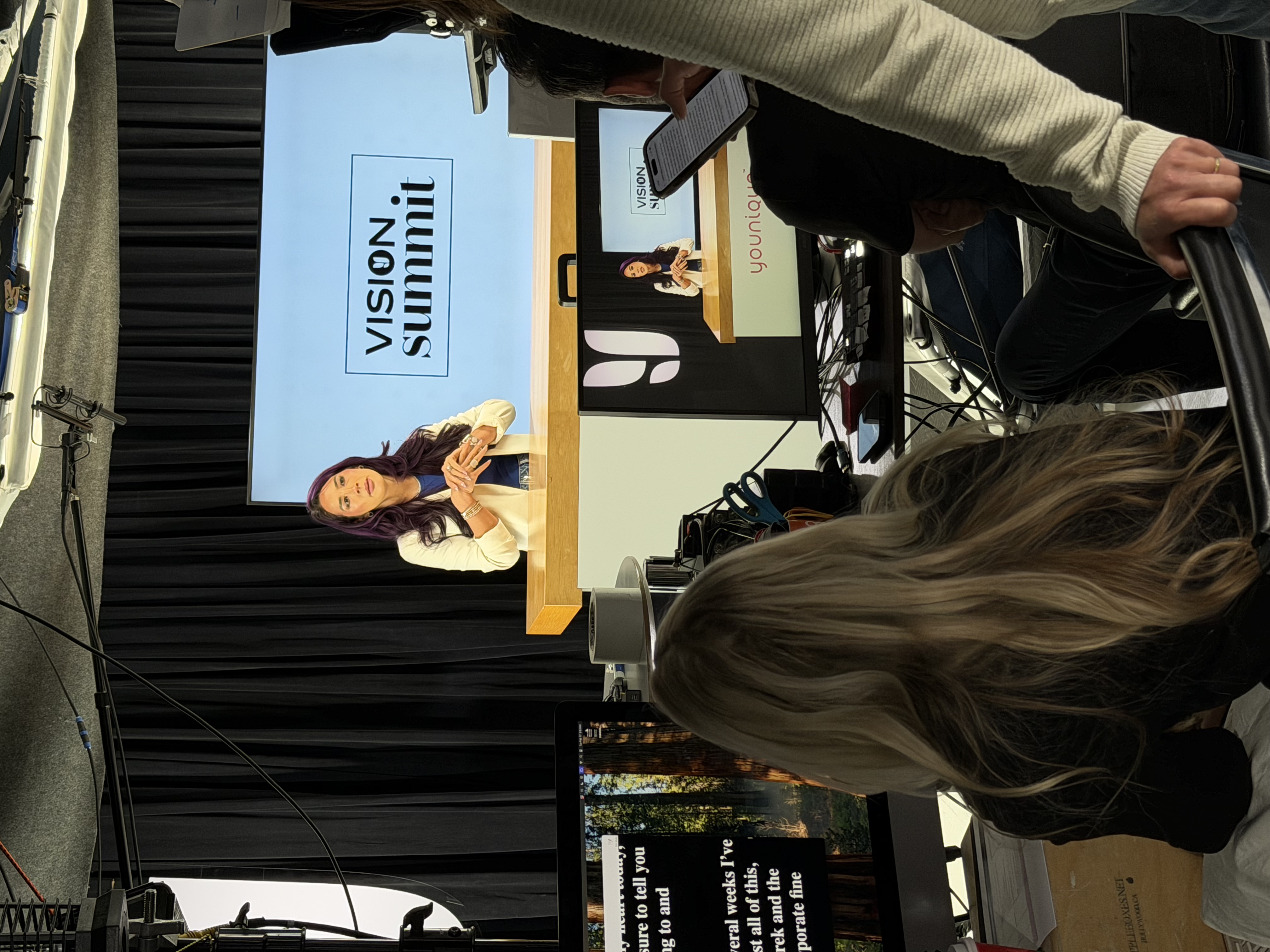 Brandi Raines speaking on stage