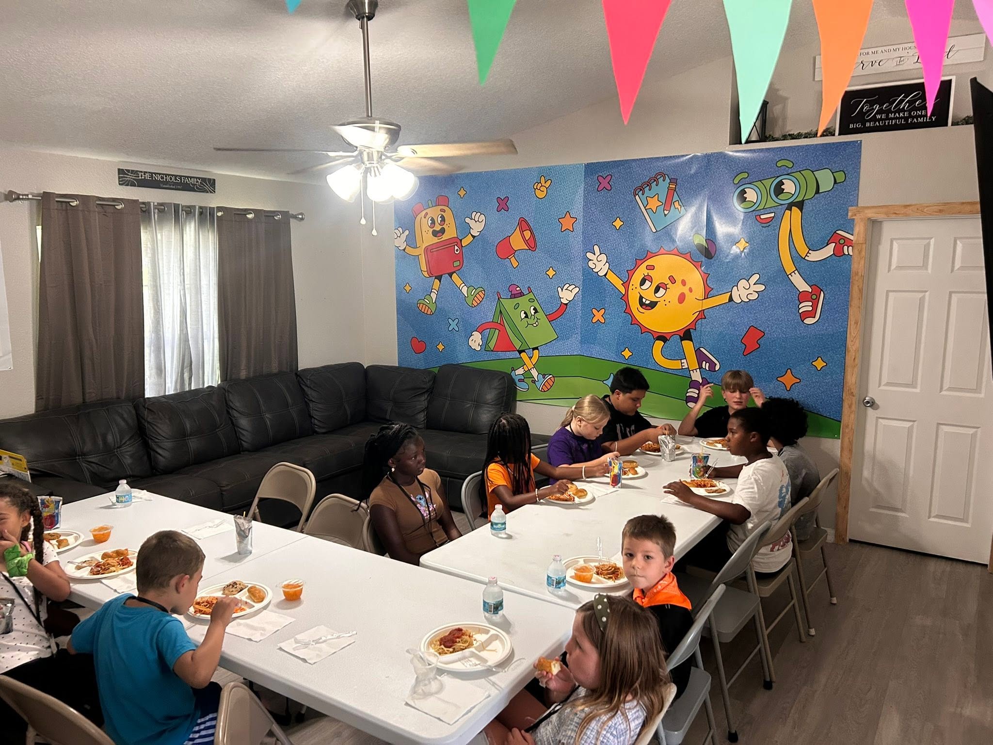 Children sharing a meal at church