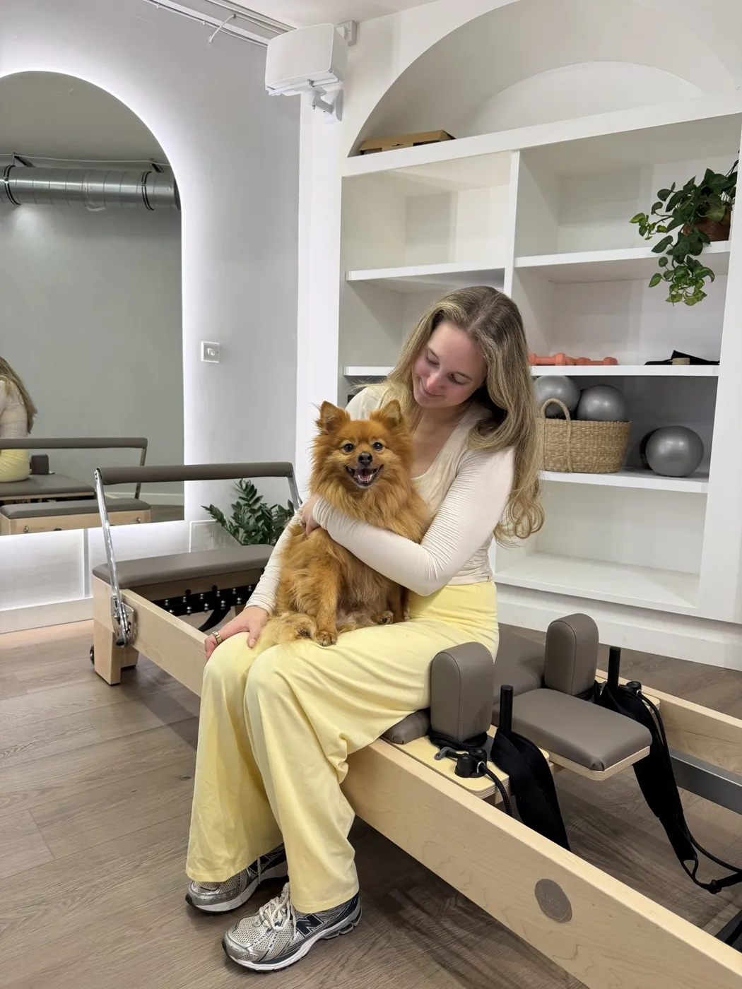 A client with her dog in the studio