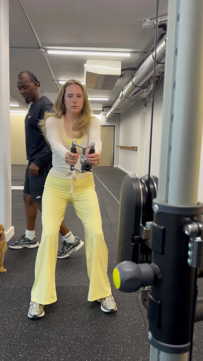 Abi coaching a client at Abis Fitness Club