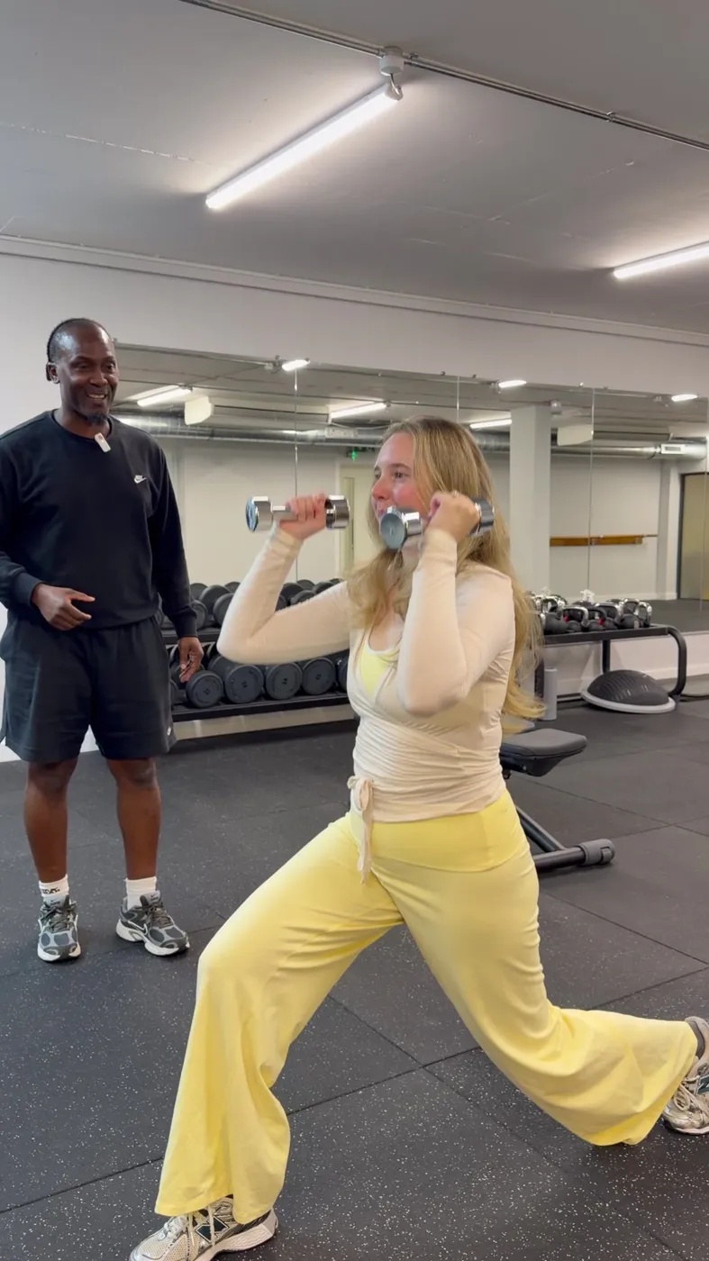 A client training with her coach