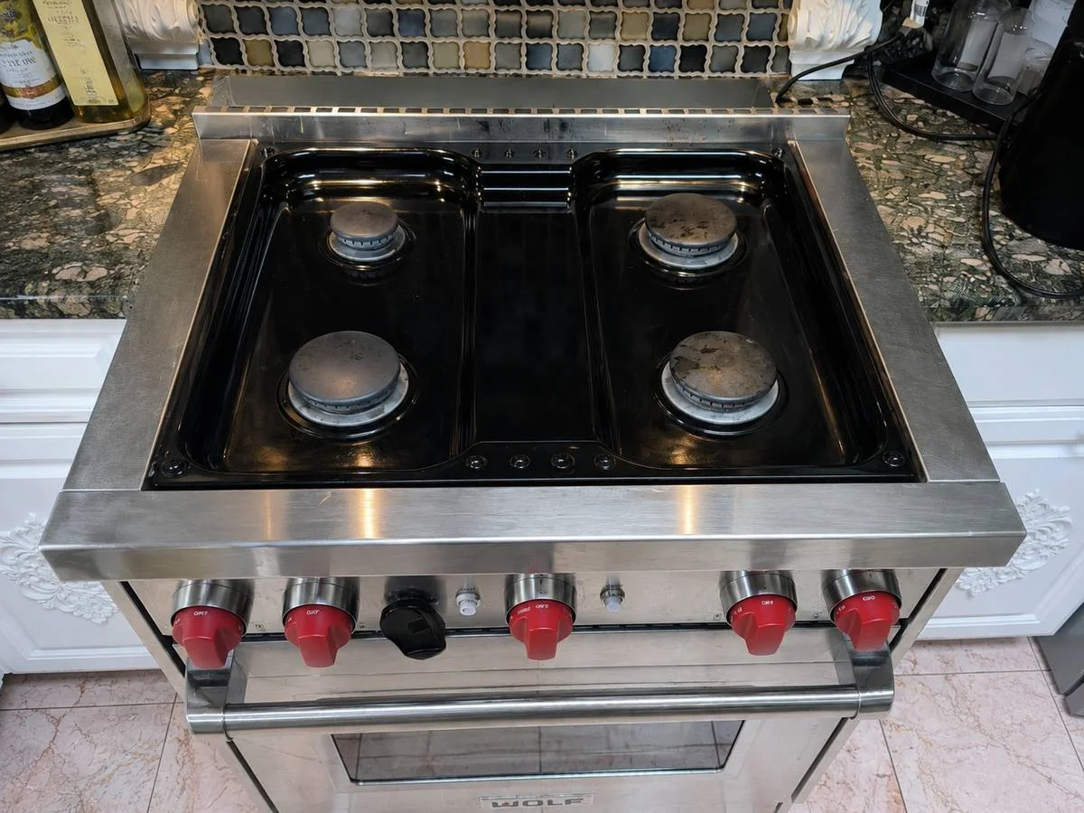 Burners clicking, not igniting reliably &mdash; Wolf GR304 gas range, Sandy Springs, GA