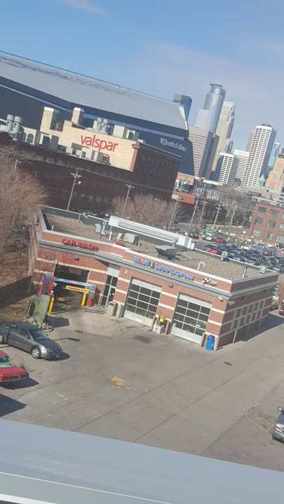 Looking down Washington Avenue from the Bobby & Steve's roof toward the downtown Minneapolis skyline