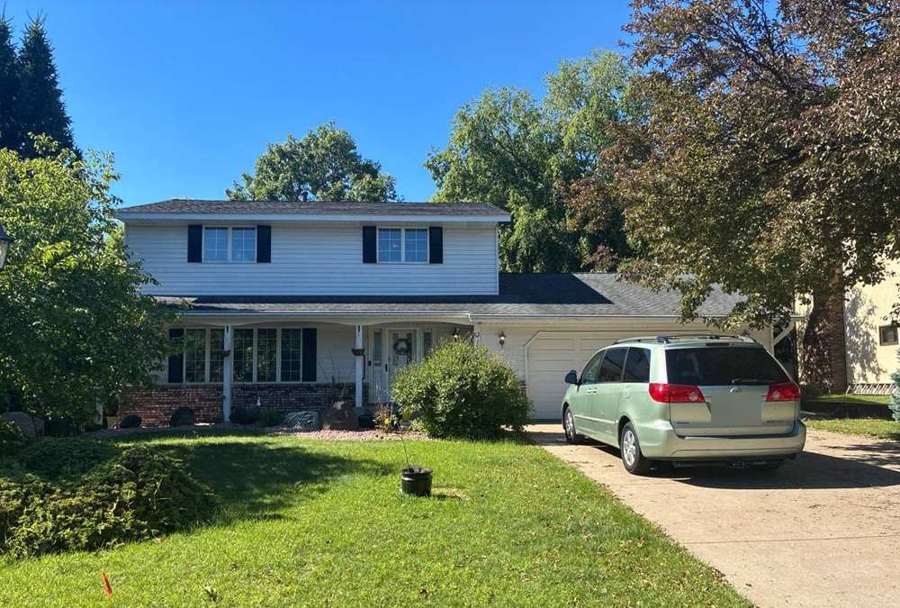 Two-story Roseville home on Willow Circle photographed during a roof inspection, June 2026
