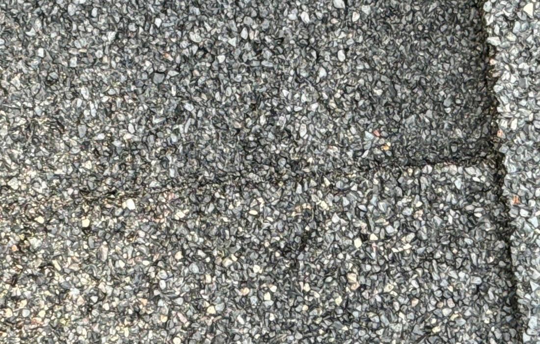 Ridge vent and cap shingles checked during a Clearwater inspection, July 2024