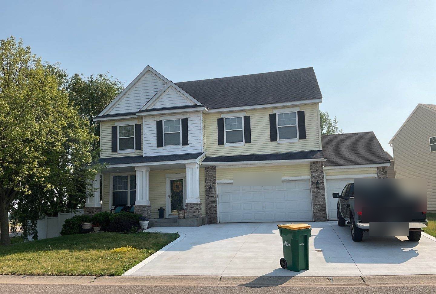 Two-story home in Apple Valley, MN photographed by Repair King during a roof inspection