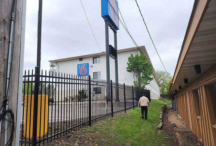 Motel 6 building and sign on Old Hudson Road in St. Paul during a Repair King roof inspection