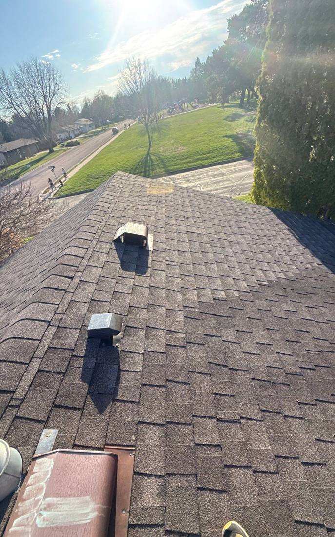 Aerial view from the roof of a Greenwood Place condo building in Faribault, MN, overlooking the neighborhood park