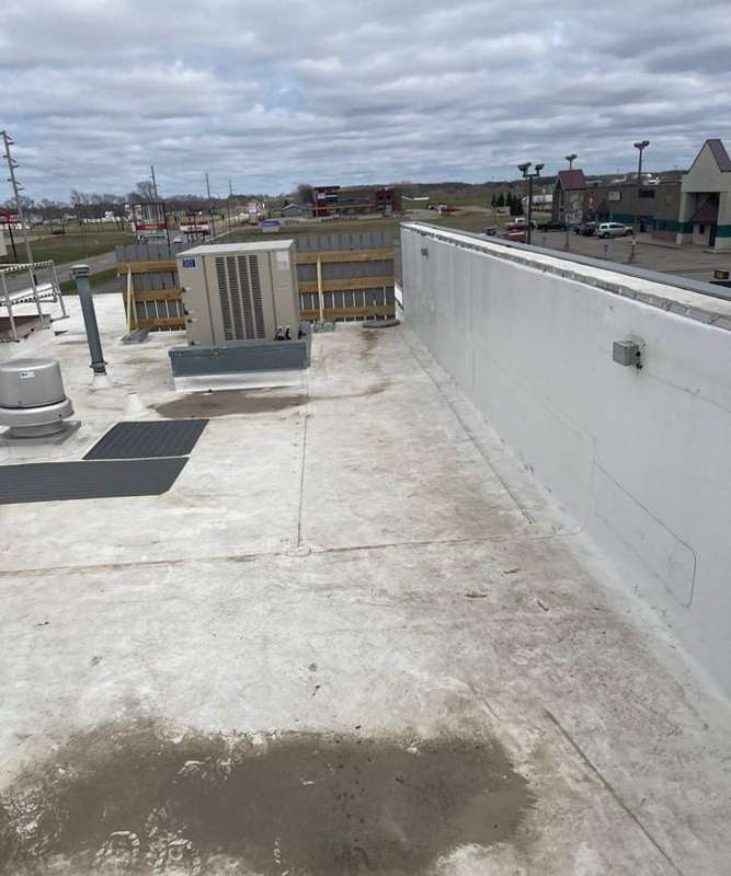Flat commercial roof and rooftop units at Sauk Centre's McDonald's, May 2022