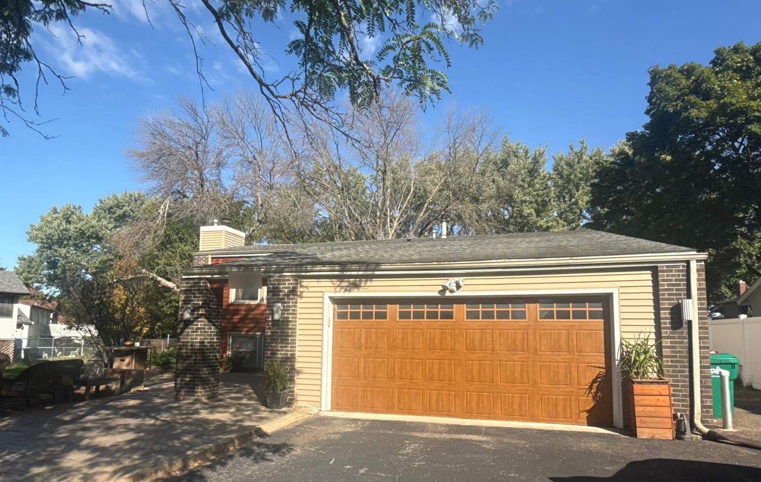 Split-level home in Burnsville, MN photographed by Repair King during an October 2025 roof inspection
