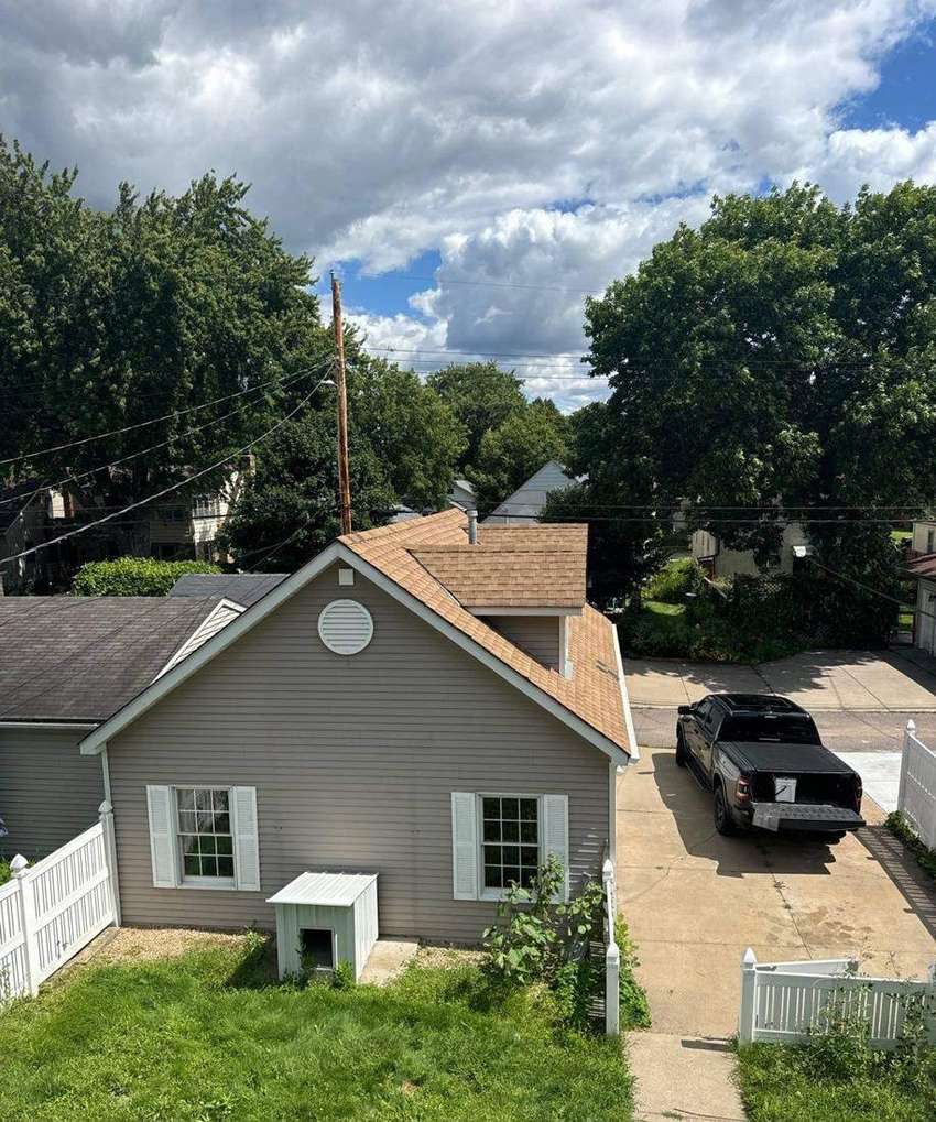 Aerial view of a finished roof off Cleveland Street in Northeast Minneapolis, August 2024