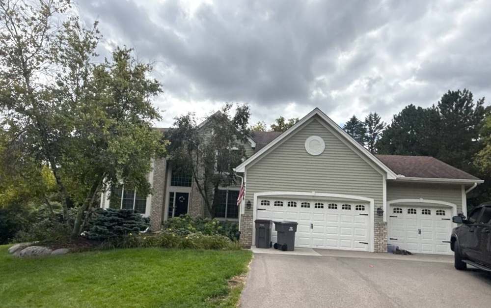 Two-story Chanhassen home with a three-car garage, photographed during our September 2025 inspection