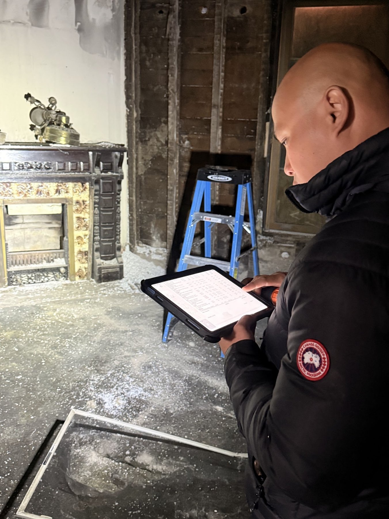 Repair King inspector documenting findings on a tablet