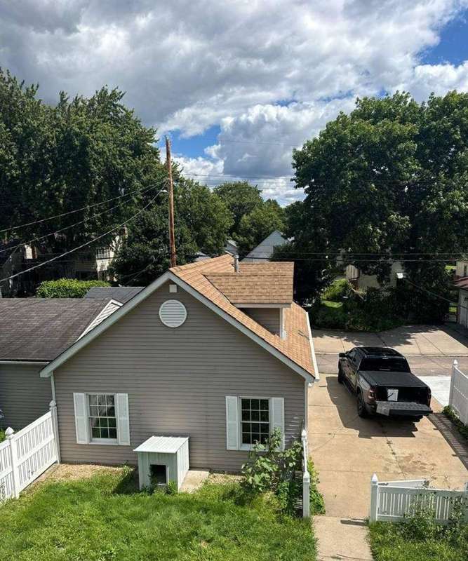 Aerial view of a finished roof off Cleveland Street in Northeast Minneapolis, August 2024