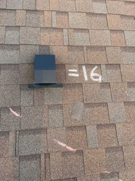 A marked box vent on a Pinecone Villas townhome roof in Sartell, September 2021
