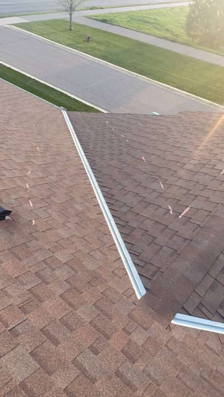 Ridge and valley on a Pinecone Villas townhome roof in Sartell, September 2021