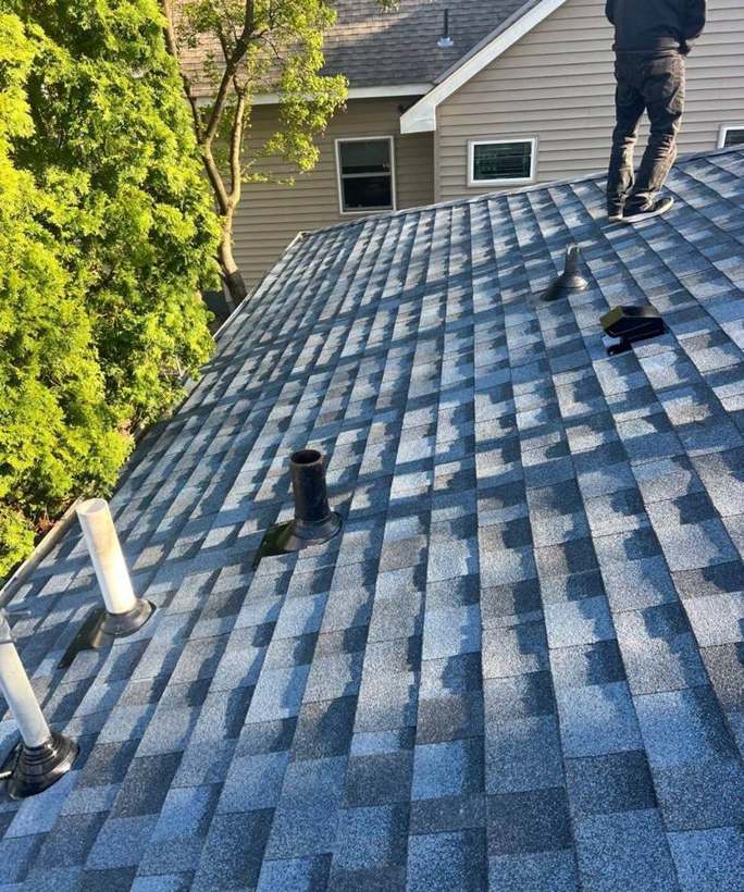 New blue-gray architectural shingles on an east St. Louis Park, MN home after Repair King's May 2024 re-roof